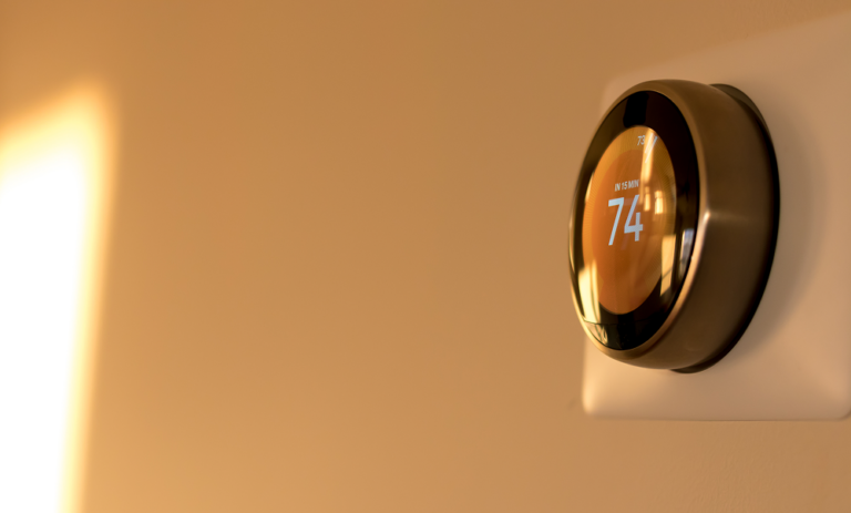 Close up orange smart thermostat -