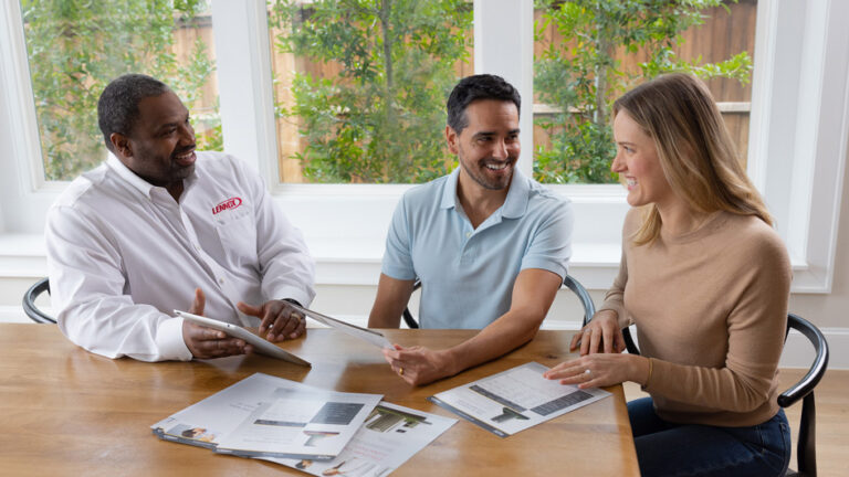 tech and homeowners discussing buying units
