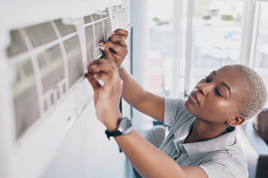 tech working on ductless minisplit