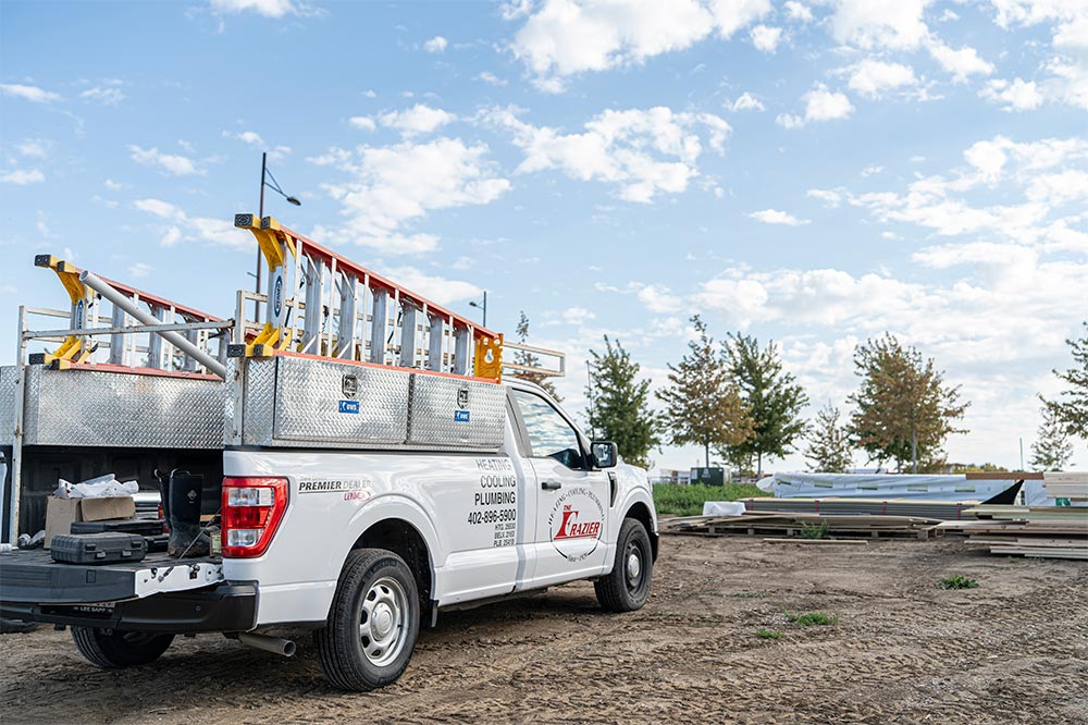 The Frazier Company truck at a job site