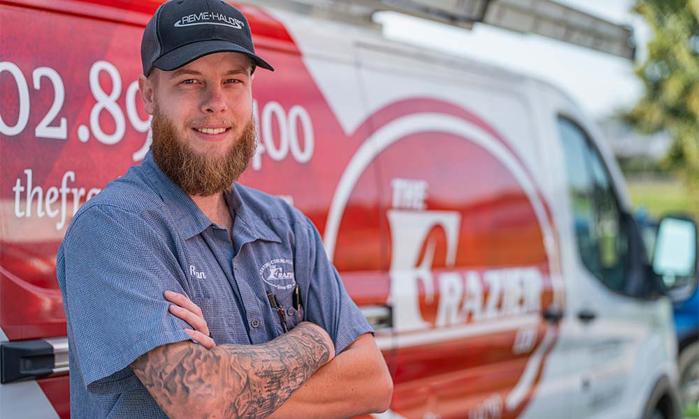 Tech in front of the Frazier van